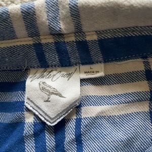 Long sleeved flannel White Crow shirt size L. Lace on both sides.